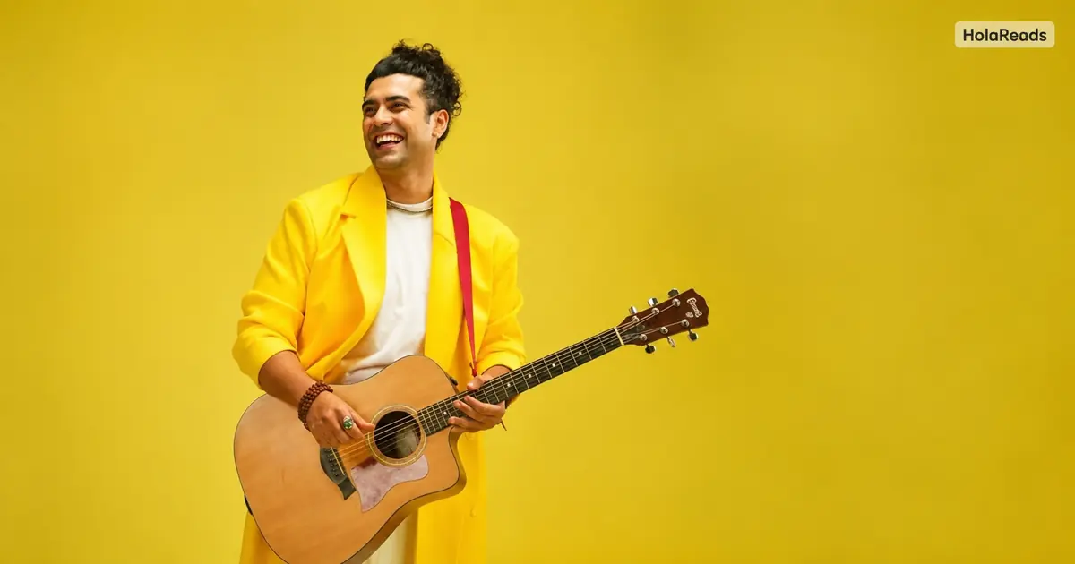 Jubin Nautiyal net worth 2026 – Indian singer holding an acoustic guitar