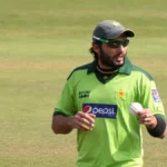 Shahid Afridi net worth profile holding a cricket ball